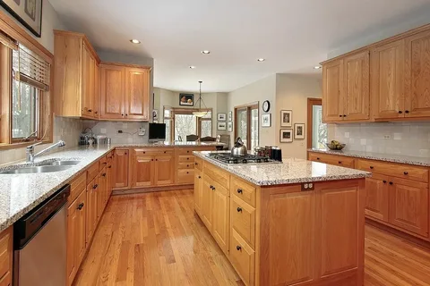 Space-saving kitchen shelving units by expert kitchen carpentry services Dubai