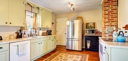 Custom kitchen cabinets Dubai with wooden island and storage drawers