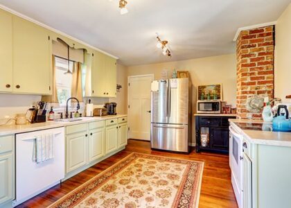 Custom kitchen cabinets Dubai with wooden island and storage drawers